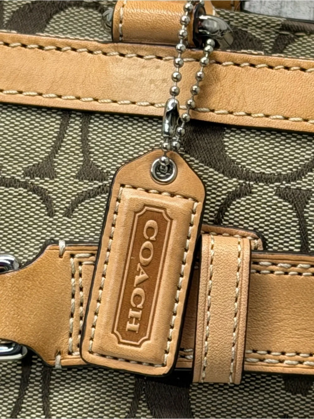 Coach iconic signature